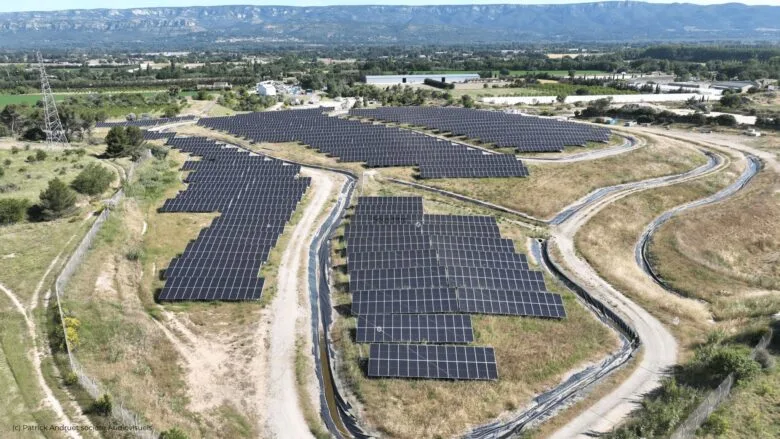 Aerial shot of a large solar installation in Mallemort, France, part of a citizen-led renewable energy project.